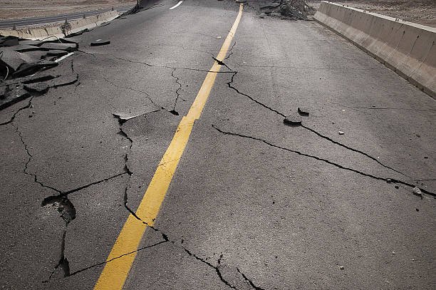 cracked asphalt after earthquake